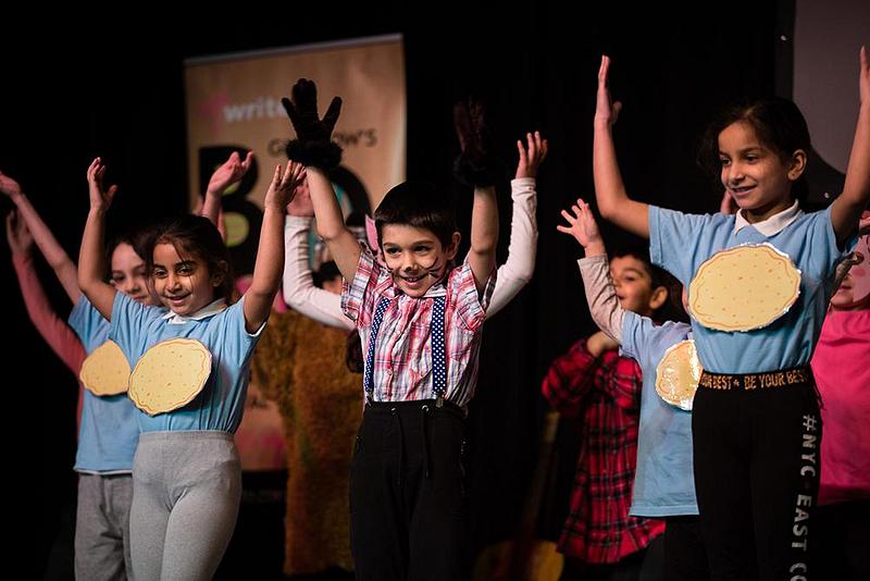 Children performing on stage