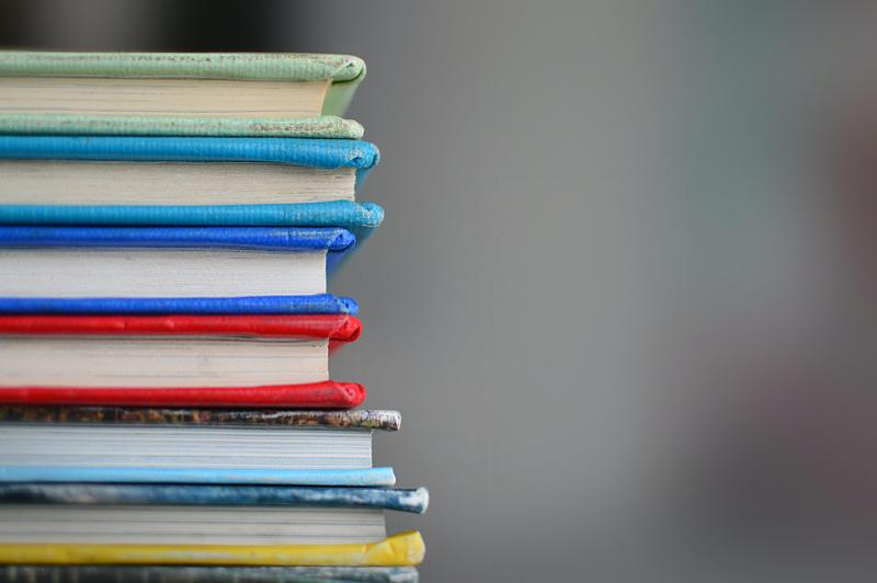 Stack multi-coloured of books