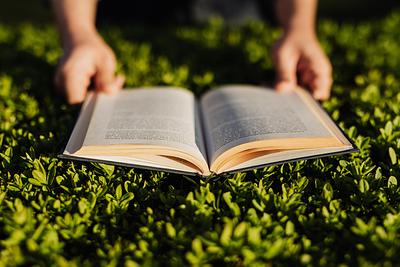 Book being read outdoors