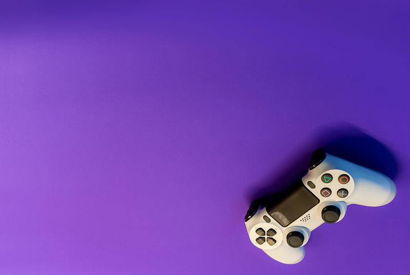 Purple background with gaming controller