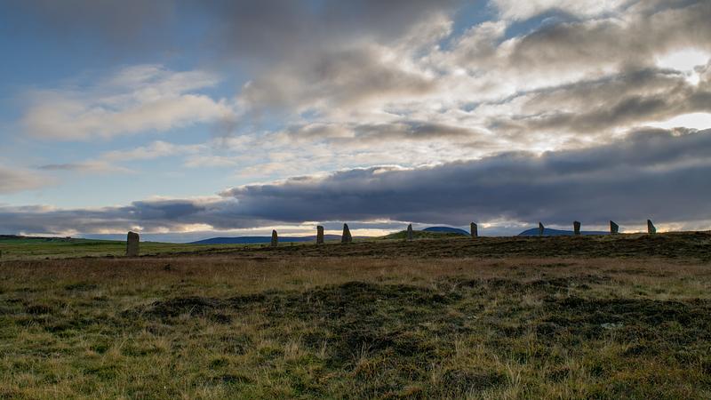 A moody picture of a Scottish landscape under a cloudy sky